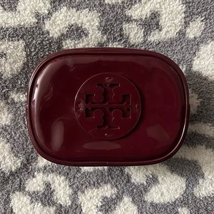 burgundy Tori Burch small patent cosmetic bag